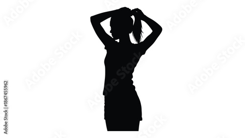 Silhouette of a woman with arms raised above her head