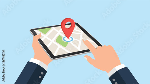 Hands holding a digital tablet with a map application, using a finger to select a location with a red map pin for GPS navigation.