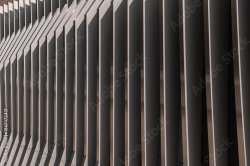 Metal rails on the facade of the building
