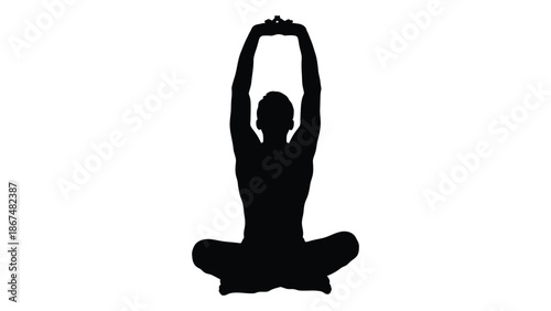 Silhouette of a person practicing a yoga pose with hands raised