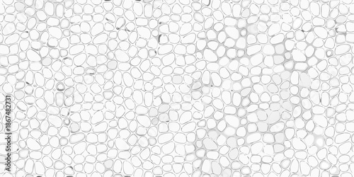 Close up view of a pebble mosaic surface in monochrome shades