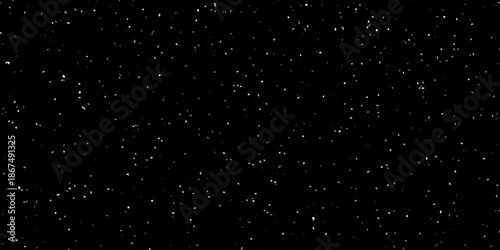 Terrazzo black background with scattered gray and white dots. Rock spatter stone marble backdrop. Black wall texture with noise overlay pattern. Vintage quartz terrazzo flooring.