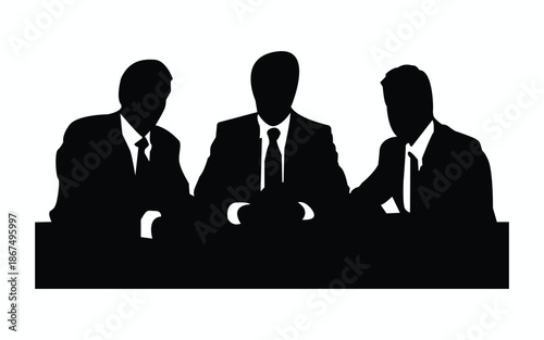 Silhouette of three professional businessmen sitting at conference table meeting