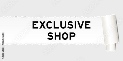 Ripped gray paper background that have word exclusive shop under torn part