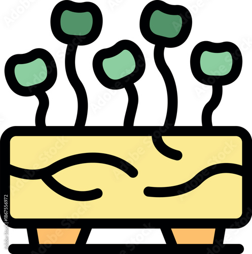 Microgreens growing in modern wooden pot with legs, representing home gardening and urban farming
