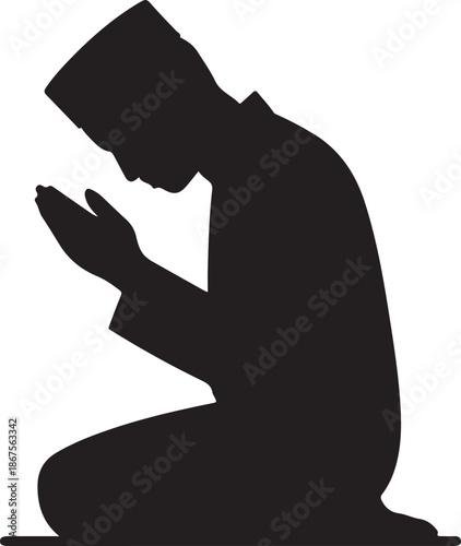 A reverent black silhouette of a Muslim man kneeling on the ground while engaged in quiet prayer