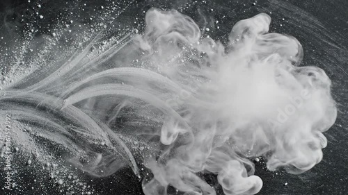 Wallpaper Mural Abstract motion background featuring swirling patterns of white chalk particles dynamically floating and merging on a dark textured classroom slate board presentation, greenboard, texture Torontodigital.ca