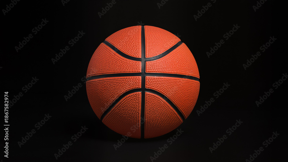 Fototapeta premium basketball on black. Basketball ball isolated on black background professional sports equipment. 