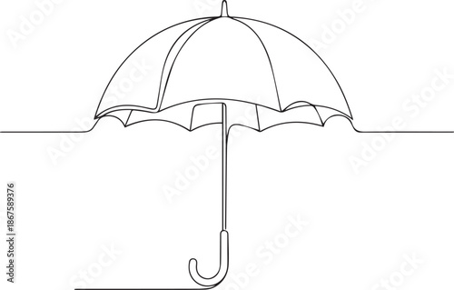 Modern umbrella standing alone in rain with minimalist design