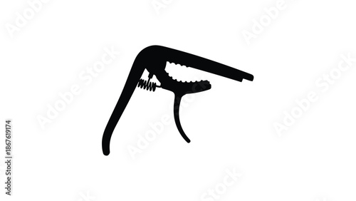 Black silhouette of a guitar capo isolated on white background