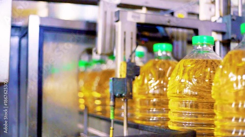 Wallpaper Mural Industrial oil factory showcasing large storage tanks, pipelines, machinery, and production facilities used for oil refining and processing. This footage highlights heavy industry, energy production. Torontodigital.ca