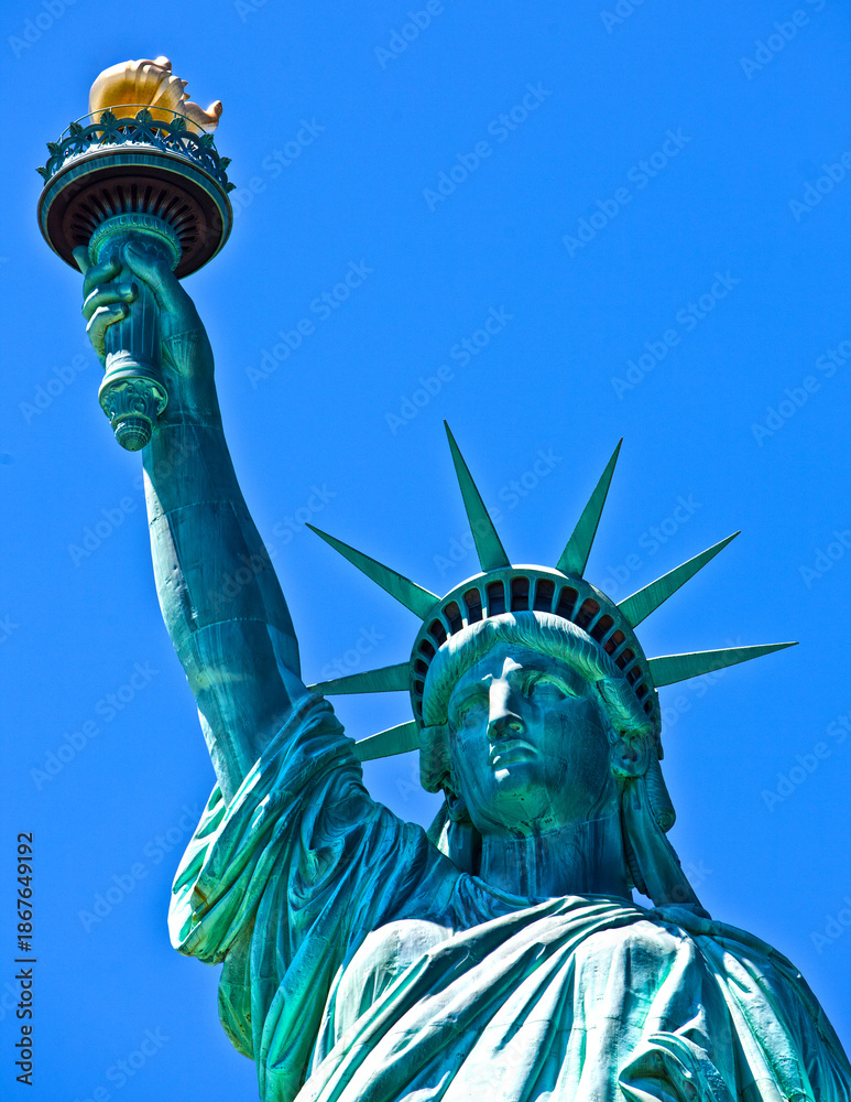 Fototapeta premium The iconic Statue of Liberty on Liberty Island in New York
