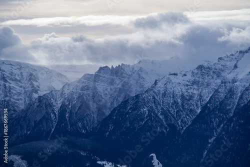 clouds over the mountains, Bucegi Mountains, view from the Postavaru Mountains, Romania 
