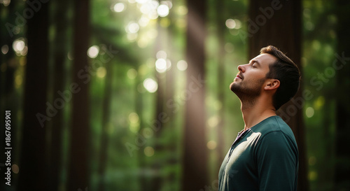 A serene man breathing fresh forest air in sunlight, perfect for nature therapy concepts, environmental health goals, and wellness plans