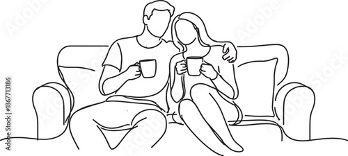 Couple Relaxing and Drinking Coffee Together on Couch