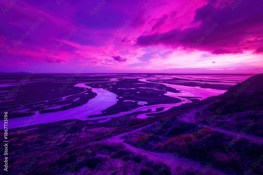 Fototapeta premium A purple sky with a river running through it