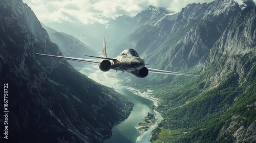 An airplane soaring above a river amidst mountain peaks under the blue sky with clouds.