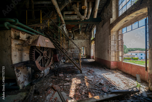Fotografie Vintage machinery inside an abandoned sugar refinery in Italy