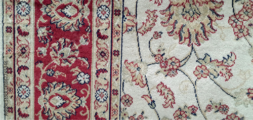 Carpet texture with a floral pattern in the antique baroque style. Floral abstract pattern carpet classic, red floral background, red carpet print. Interior design, home decor.