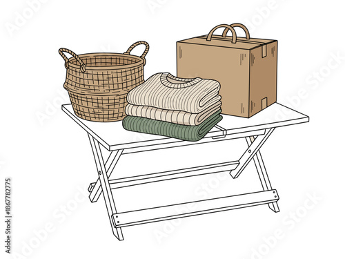 Foldable table with clothes, box and basket for indoor rummage sales illustration