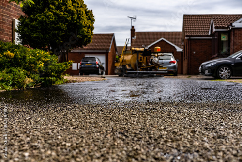 hot bitumen surface dressing using specialised machine tar and chip old road construction grudge work 