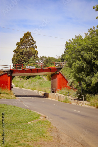 old railway bridge over country road in regional tourism town of Daylesford