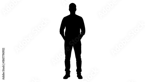 Silhouette of a man standing with hands in pockets in a casual pose
