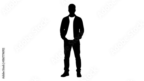 A silhouette of a man standing with his hands in his pockets