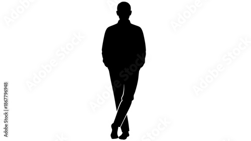 Silhouette of a man walking alone on a plain surface with his hands in his pockets