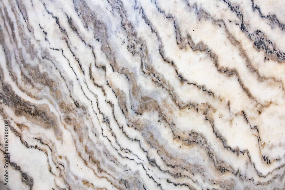 Fototapeta premium White and gray marble texture with natural veining patterns in abstract design