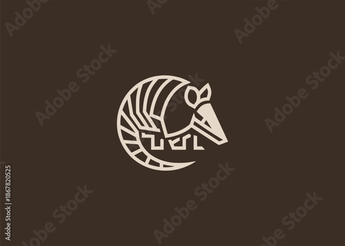 A geometric simple armadillo logo with clean segmented shapes, representing protection, durability, adaptability, balance, and strategic defense