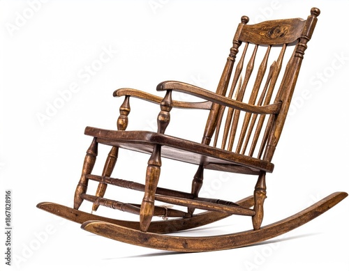 Brown, wood rocking chair tilted, against white backdrop
