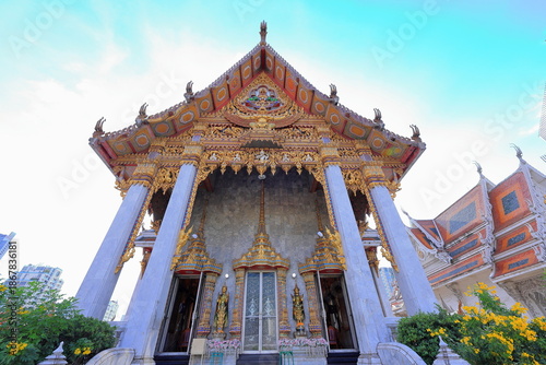 Photography Wat Hualamphong, a royal Buddhist temple with ornate details and a colorful, cha