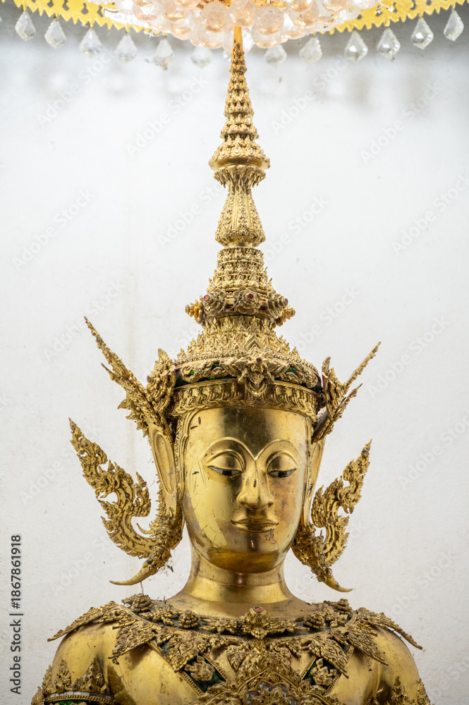Fototapeta premium The mock-up of Phra Fang Buddha statue in Wat Phra Fang temple in Uttaradit province of Thailand. The real statue is currently preserved at Wat Benchamabophit, Bangkok.