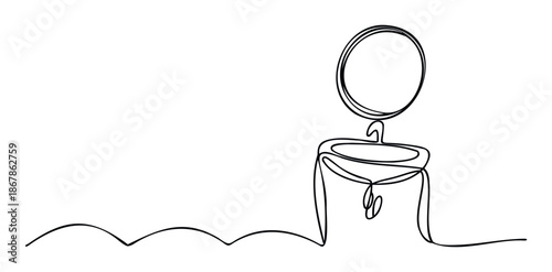 Continuous line drawing of a modern bathroom sink, faucet, and round mirror, ideal for minimalist home decor, plumbing service promotions, or interior design concepts.