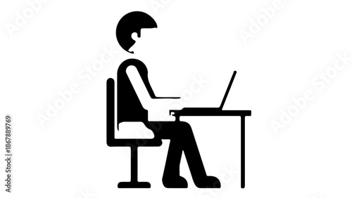 A silhouette illustration of a business woman sitting at an office desk and typing on a laptop computer while working