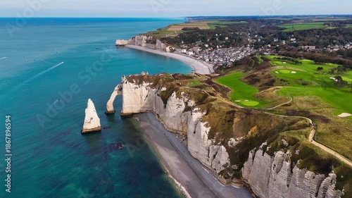 Wallpaper Mural Aerial drone view of picturesque coastal limestone cliffs and the English Channel town of Etretat, France. High quality 4k footage Torontodigital.ca