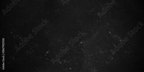 Black charcoal wall Stone concrete texture grungy backdrop background. dark grey black slate texture background. Black texture chalk board and black board.