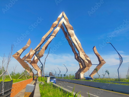 Kabanaran Bridge connects Kulon Progo and Bantul on Java’s Southern Cross Road, featuring a central gunungan-style gateway that reflects Javanese culture and local identity
