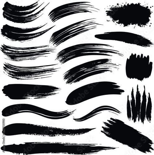 Set of black ink brush strokes and splatters for design