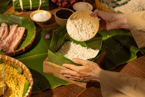 Traditional Vietnamese Chung cake ingredients arranged during Tet preparation, showing cultural significance of rice cakes in Lunar New Year celebrations