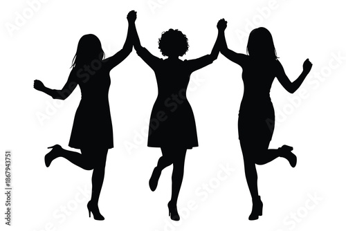 Three women in dresses jumping and holding hands in celebration together