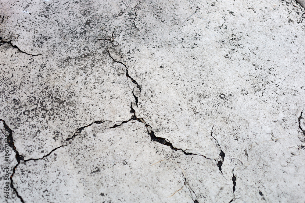 Fototapeta premium Abstract grunge texture of broken white painted cement floor.