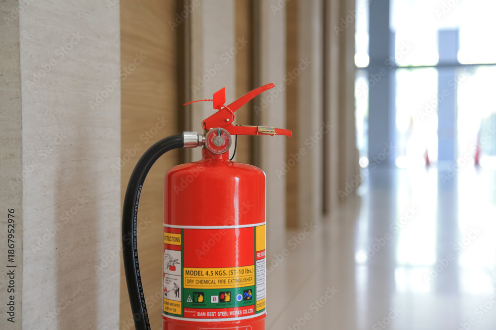 Obraz premium Fire extinguishing system, emergency equipment installed in the corridors inside the building for fire prevention