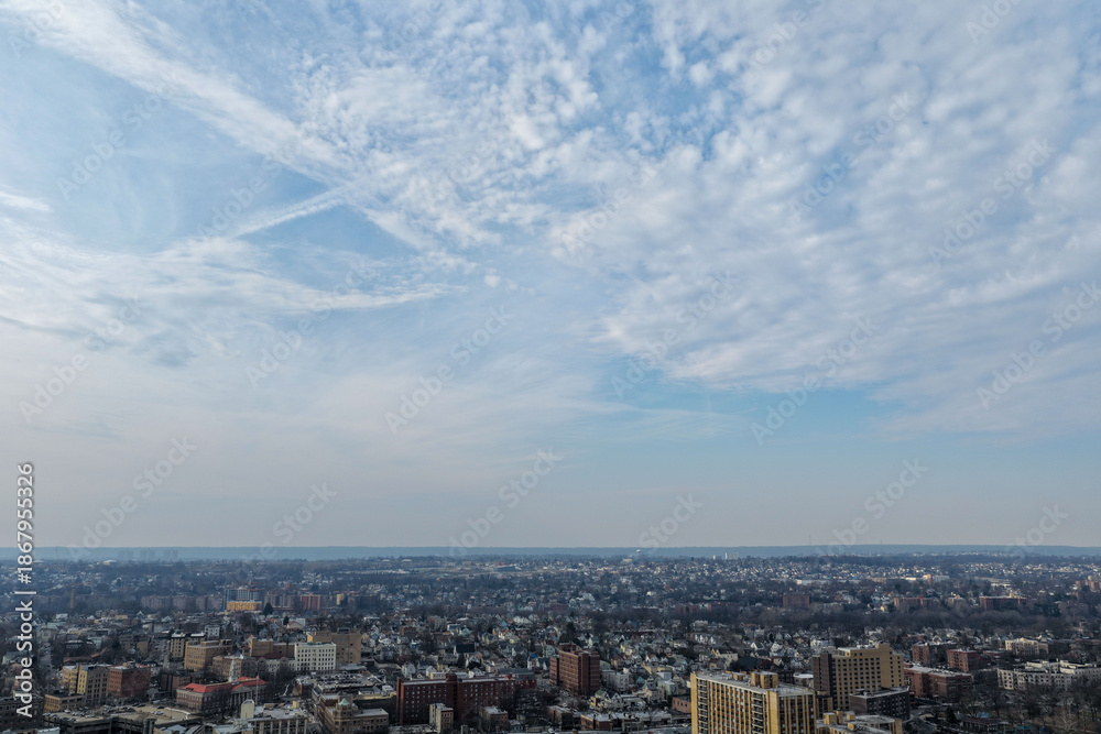 Fototapeta premium Foggy aerial drone photo of Mount Vernon New York with overcast winter sky and dense neighborhoods, image 23