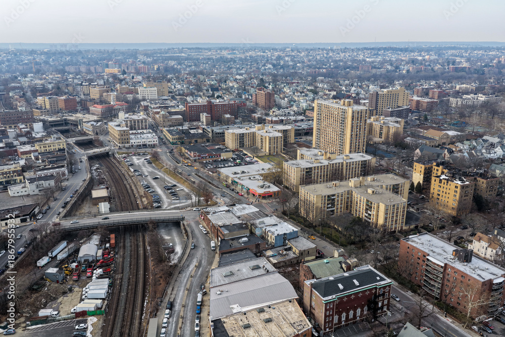 Obraz premium Foggy aerial drone photo of Mount Vernon New York with overcast winter sky and dense neighborhoods, image 22