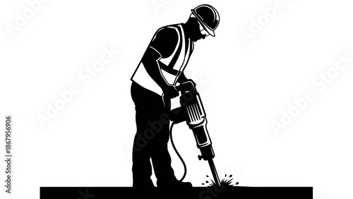 Construction worker using a jackhammer for drilling and breaking concrete surfaces effectively