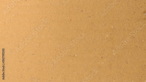 Old paper background. Brown old paper texture. Smooth craft brown paper macro texture.