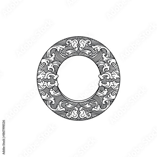Ornate circular frame with intricate floral pattern.