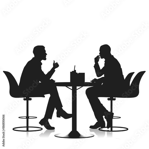 Black silhouette of two men sitting at a table having a conversation symbolizing discussion interview communication meeting and dialogue isolated on white background.